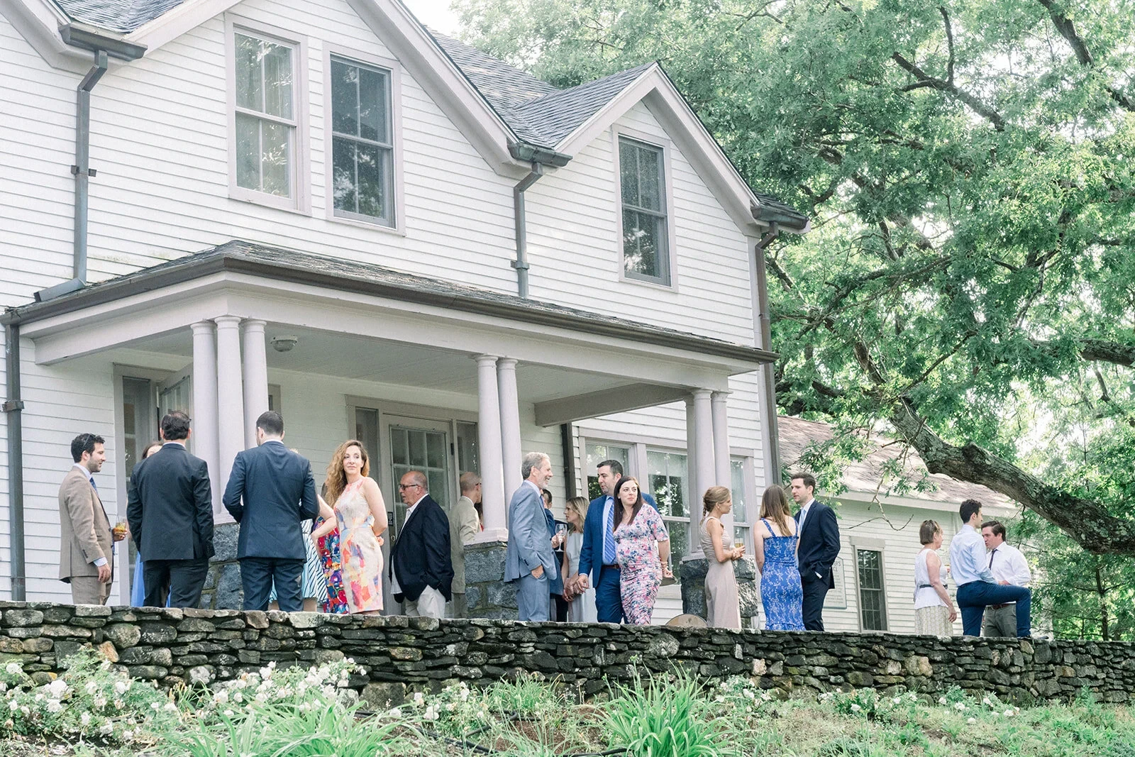 Outdoor social event at farmhouse porch