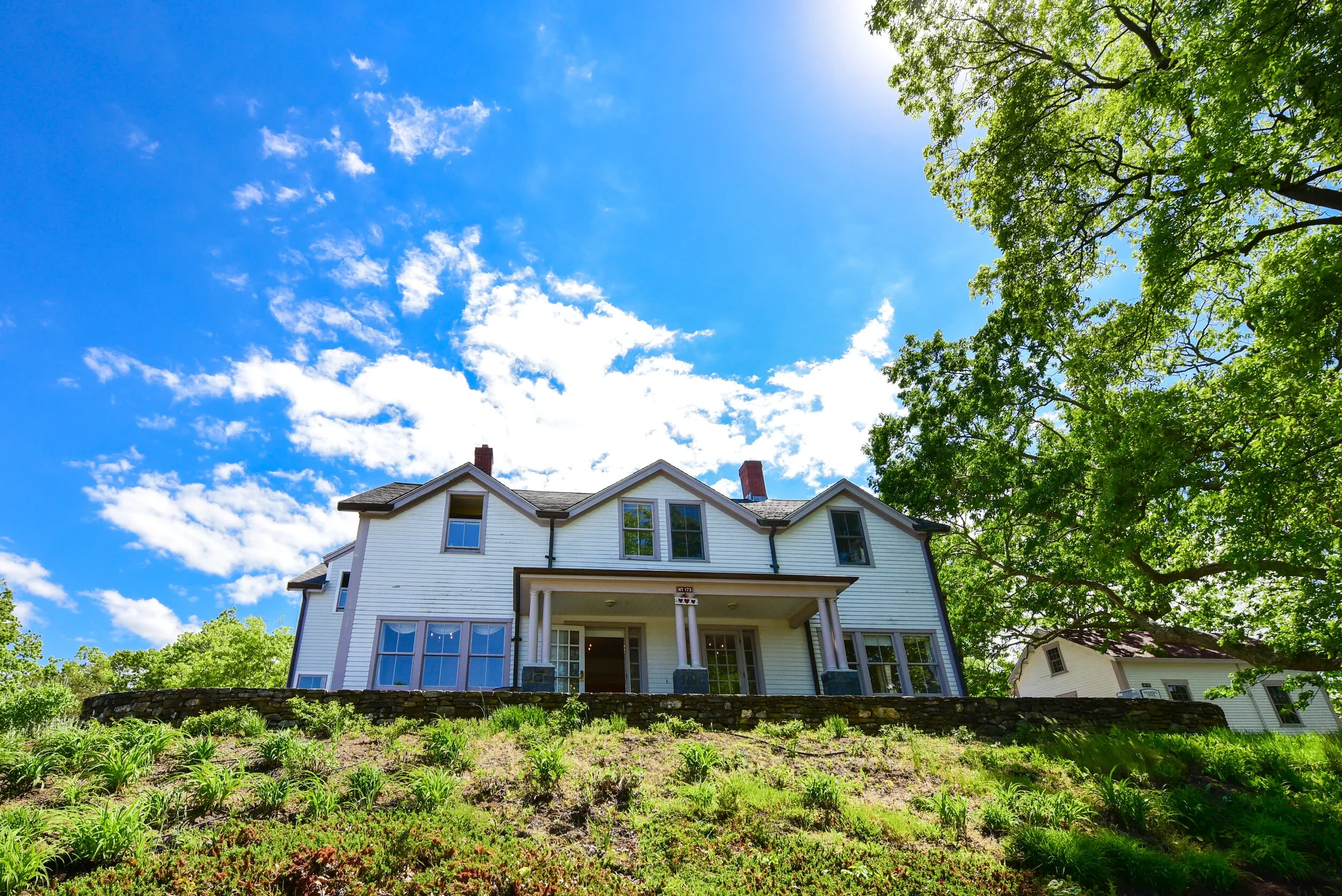Historic white farmhouse exterior